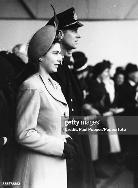 Princess Elizabeth and Lieutenant Philip Mountbatten attend the launch of the liner 'Caronia' at the John Brown & Company shipyard at Clydebank on...
