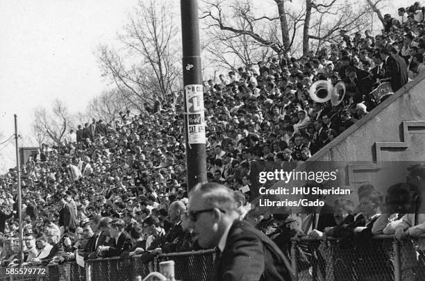 Sports stadium is packed with spectators during an N.C.A.A. Division one lacrosse game, in which one team was Johns Hopkins University, 1975. .