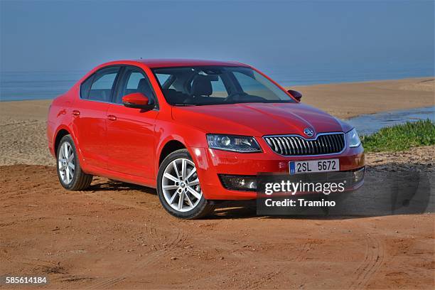 skoda octavia iii on the beach - skoda auto stock pictures, royalty-free photos & images