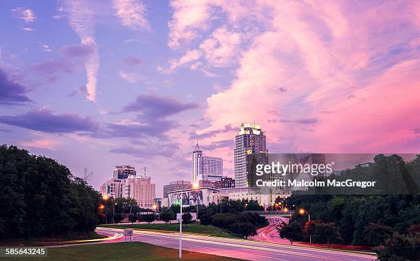 the raleigh skyline at sunset - raleigh ストックフォトと画像