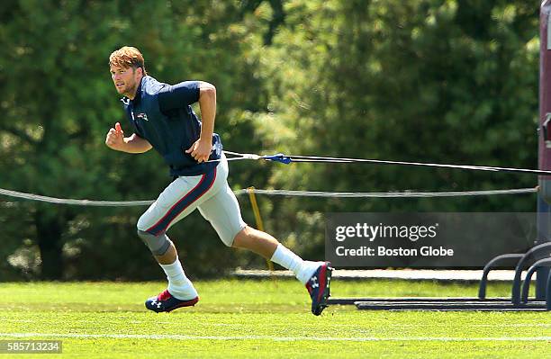 Tom Brady stayed after practice to run sprints attached to a long bungee cord for resistance. The New England Patriots continued their Training Camp...