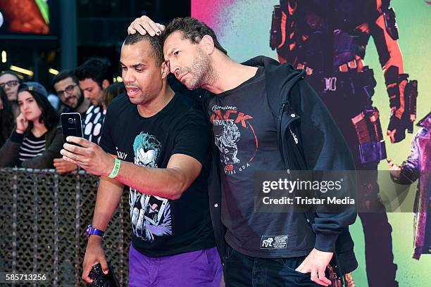 German moderator Patrice Bouedibela and US musician Evil Jared Hasselhoff attend the Suicide Squad Live Event at CineStar on August 3, 2016 in...