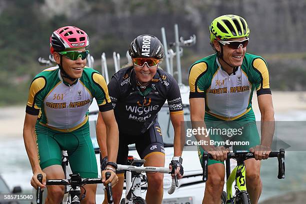 Louis Meintjes of South Africa, Rochelle Gilmore of Australia and Daryl Impey of South Africa ride the road race course in training on August 3, 2016...