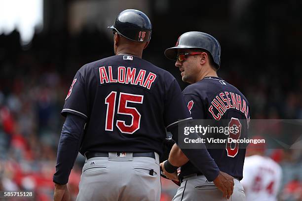 Lonnie Chisenhall of the Cleveland Indians looks on from first base during the eighth inning of their MLB game against the Los Angeles Angels of...