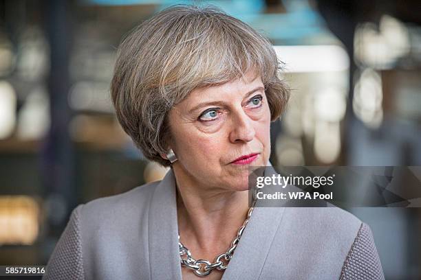 British Prime Minister Theresa May visits Martinek joinery factory on August 3, 2016 in London, United Kingdom.