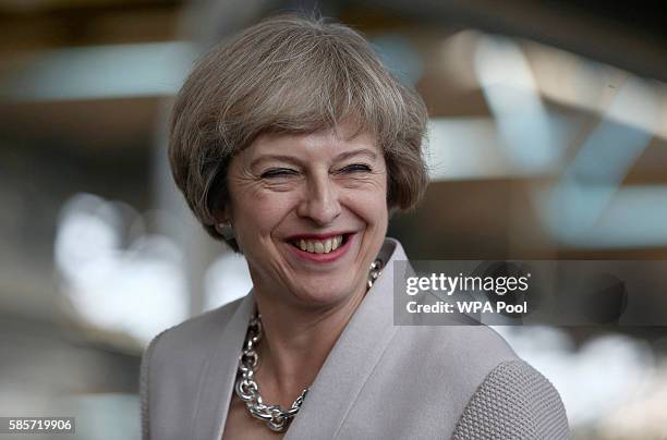 British Prime Minister Theresa May visits Martinek joinery factory on August 3, 2016 in London, United Kingdom.