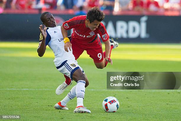 Real Salt Lake Demar Phillips, left, collides with Toronto FC Tsubasa Endoh in first half action at BMO Field where Toronto FC hosts Real Salt Lake....