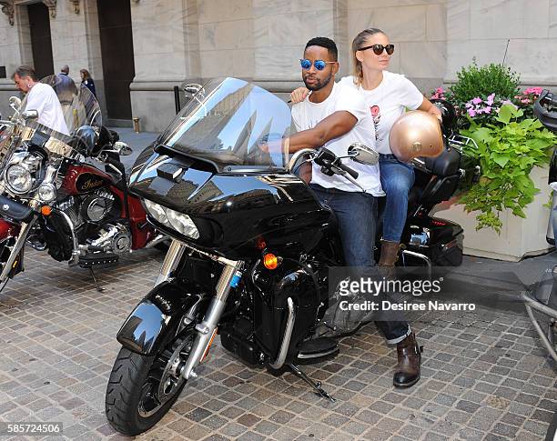 Actor Jay Ellis and model Nina Senicar attend Kiehl's And amfAR Ring The New York Stock Exchange Opening Bell In Honor Of The Kiehl's LifeRide For...