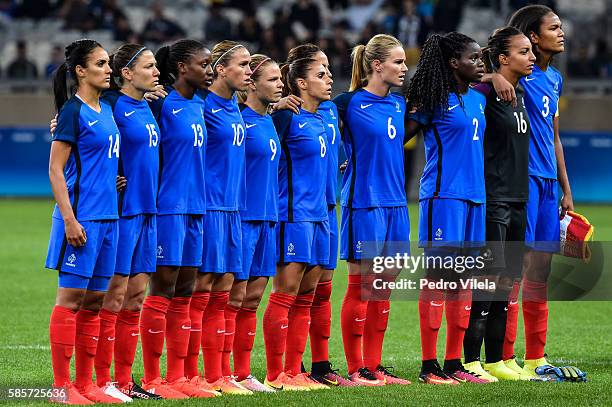 Players of the France listen to the national anthem prior to the Women's Group G first round match between France and Colombia as part of Women's...