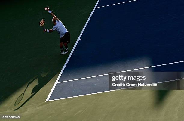 Tim Smyczek of the Unites States serves to Donald Young of the United States during the BB&T Atlanta Open at Atlantic Station on August 3, 2016 in...