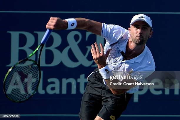 Tim Smyczek of the Unites States serves to Donald Young of the United States during the BB&T Atlanta Open at Atlantic Station on August 3, 2016 in...