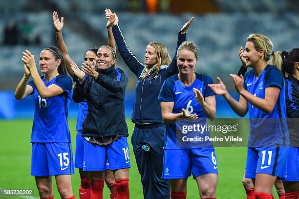 Team France celebrates on the pitch after their 4-0 win in Women's Group G first round match between France and Colombia as part of Women's Football...