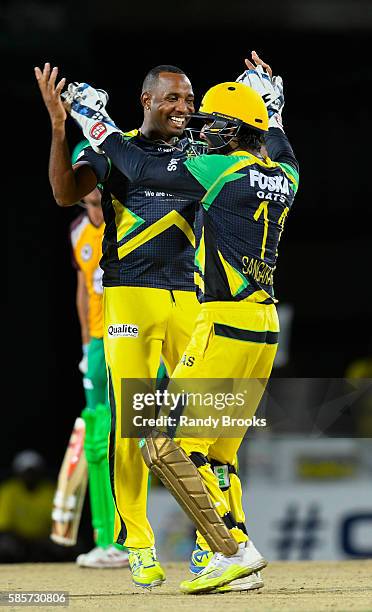 Basseterre , Saint Kitts and Nevis - 3 August 2016; Garey Mathurin and Kumar Sangakkara of Jamaica Tallawahs celebrate the dismissal of Jason...