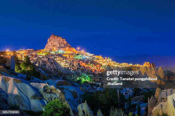 goreme at dusk, cappadocia in turkey. - ortahisar stock pictures, royalty-free photos & images