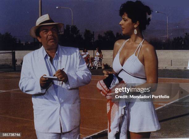 Italian comedian Lino Banfi acting in a scene of the film "Il commissario Lo Gatto" with Italian actress Licina Lentini as Mrs Belluggi. Italy, 1987