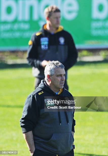 Mark Williams, Tigers Senior Development Coach and Damien Hardwick, coach of the Tigers look on during a Richmond Tigers AFL training session at Punt...