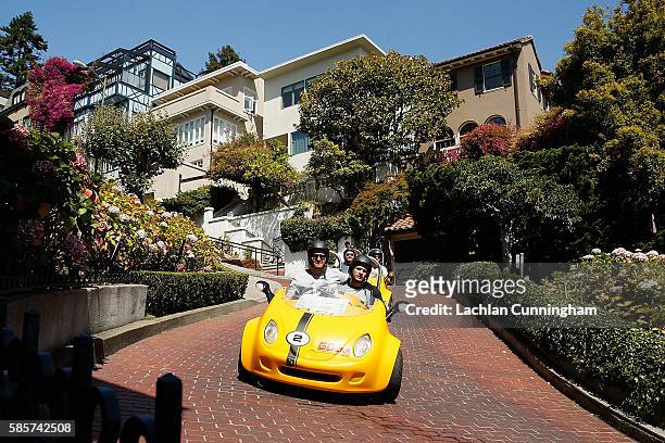James Horwill and Danny Care drive a Go-Car down the tourist attraction, Lombard Street, during the Harlequins Tour to San Francisco on August 3,...