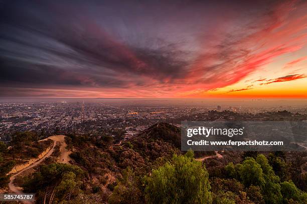 sunset sky over los angeles - griffith park stock pictures, royalty-free photos & images