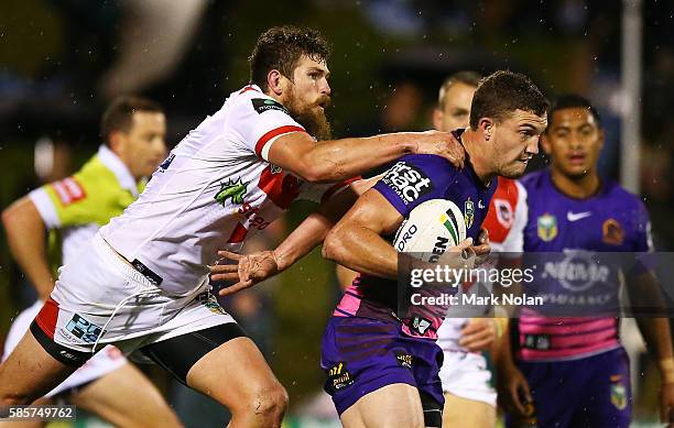 Lachlan Maranta of the Broncos is tackled during the round 22 NRL match between the St George Illawarra Dragons and the Brisbane Bronocs at WIN...