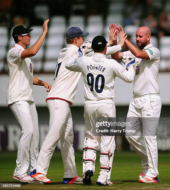Chris Rushworth of Durham celebrates after dismissing Marcus Trescothick of Somerset during Day One of the Specsavers County Championship Division...