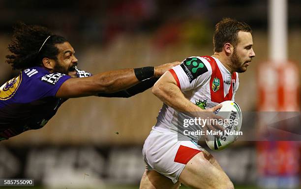 Adam Quinlan of the Dragons makes a line break during the round 22 NRL match between the St George Illawarra Dragons and the Brisbane Bronocs at WIN...