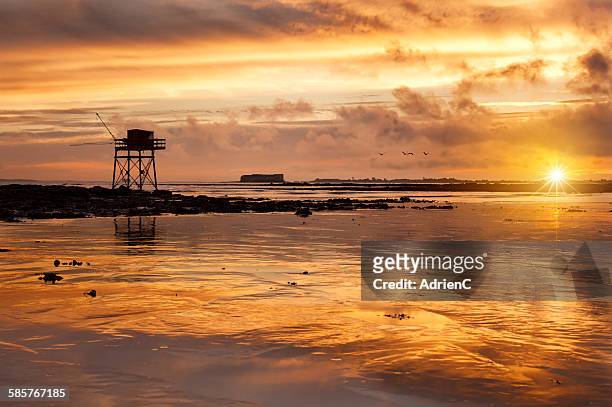 cloudy sunset - charente maritime stock pictures, royalty-free photos & images