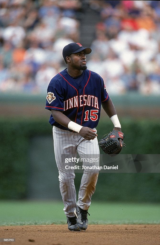 Cristian Guzman of the Minnesota Twins moves to field the ball during