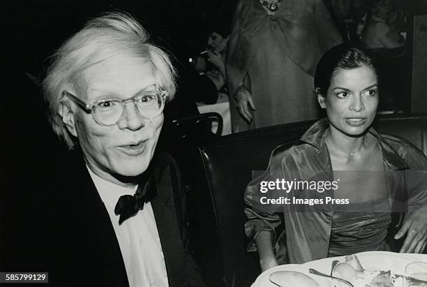 Andy Warhol and Bianca Jagger at Tavern on the Green for Bette Davis' birthday party circa 1980 in New York City.