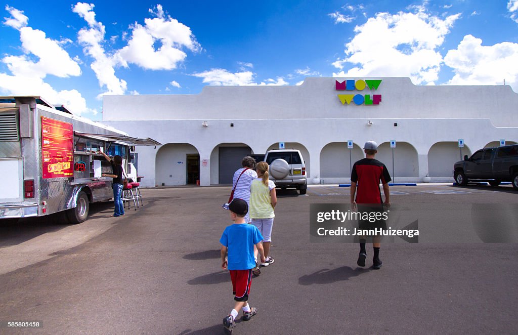 Santa Fe: Family Approaching "Meow Wolf," Multimedia Arts Funhouse