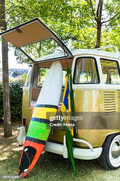 surfboard and van - vw bus stock pictures, royalty-free photos & images