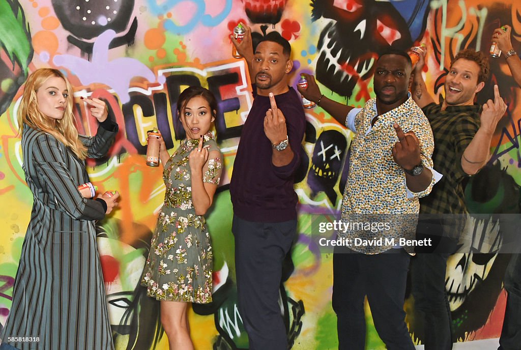 The Cast of "Suicide Squad" Add The Finishing Touches To Graffiti Artist Ryan Meades' Mural In London