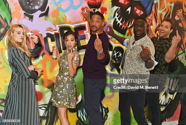 Margot Robbie, Karen Fukuhara, Will Smith, Adewale Akinnuoye-Agbaje, Jai Courtney and the cast of "Suicide Squad" put the finishing touches on...