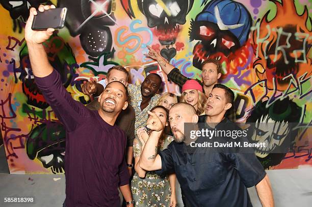 The cast of "Suicide Squad" including Will Smith, Joel Kinnaman, Adewale Akinnuoye-Agbaje, Karen Fukuhara, Margot Robbie, Cara Delevingne, Jai...