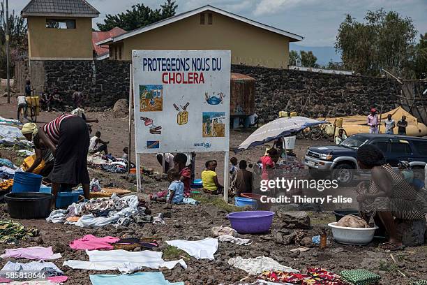 Sign in French, "Protégeons nous du choléra" is erected on the so-called "People Beach" along the Lake Kivu in Goma. Many locals come to that place...