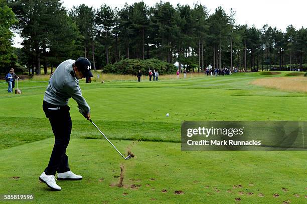 Matthew Fitzpatrick of England takes his tee shot on hole 8 on day one of the Aberdeen Asset Management Paul Lawrie Matchplay at Archerfield Links...