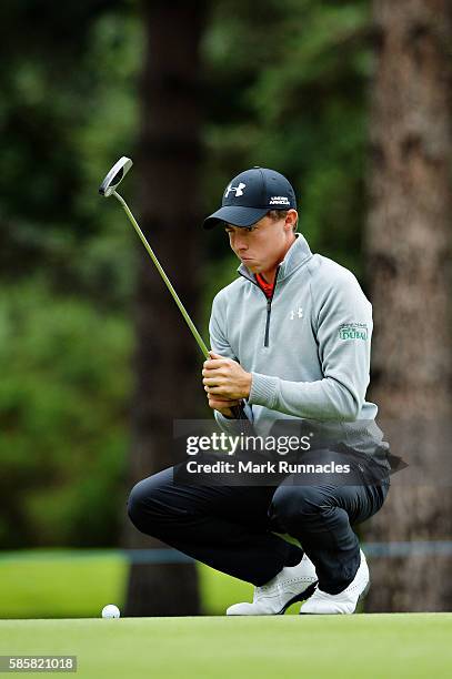 Matthew Fitzpatrick of England lines up a putt on the green at hole 8 on day one of the Aberdeen Asset Management Paul Lawrie Matchplay at...