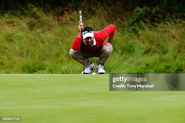 Eduardo de la Riva of Spain lines up a putt on the green at hole 18 on day one of the Aberdeen Asset Management Paul Lawrie Matchplay at Archerfield...