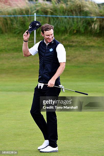 Chris Wood of England after putting on the green at hole 15 on day one of the Aberdeen Asset Management Paul Lawrie Matchplay at Archerfield Links...