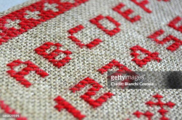 hand embroidered of letters and numbers - embroidery letters stock pictures, royalty-free photos & images
