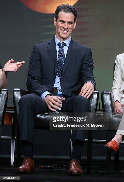 Actor Eddie Cahill speaks onstage at the 'Conviction' panel discussion during the Disney ABC Television Group portion of the 2016 Television Critics...