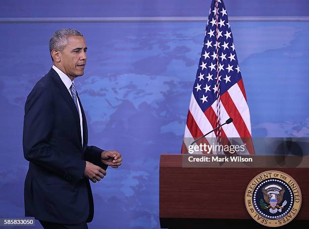 President Barack Obama walks up to speak to media after a meeting with US Secretary of Defense Ashton Carter and members of the Joint Chiefs of...