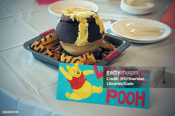 Submission for Read It and Eat It contest, and edible book festival at Milton S Eisenhower Library, Johns Hopkins University, showing a cake made of...
