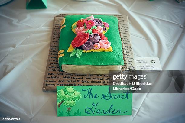 Submission for Read It and Eat It contest, and edible book festival at Milton S Eisenhower Library, Johns Hopkins University, showing a cake made of...