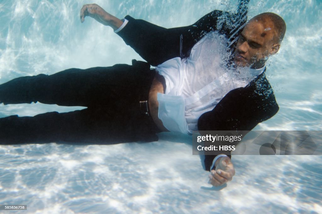 Underwater businessman