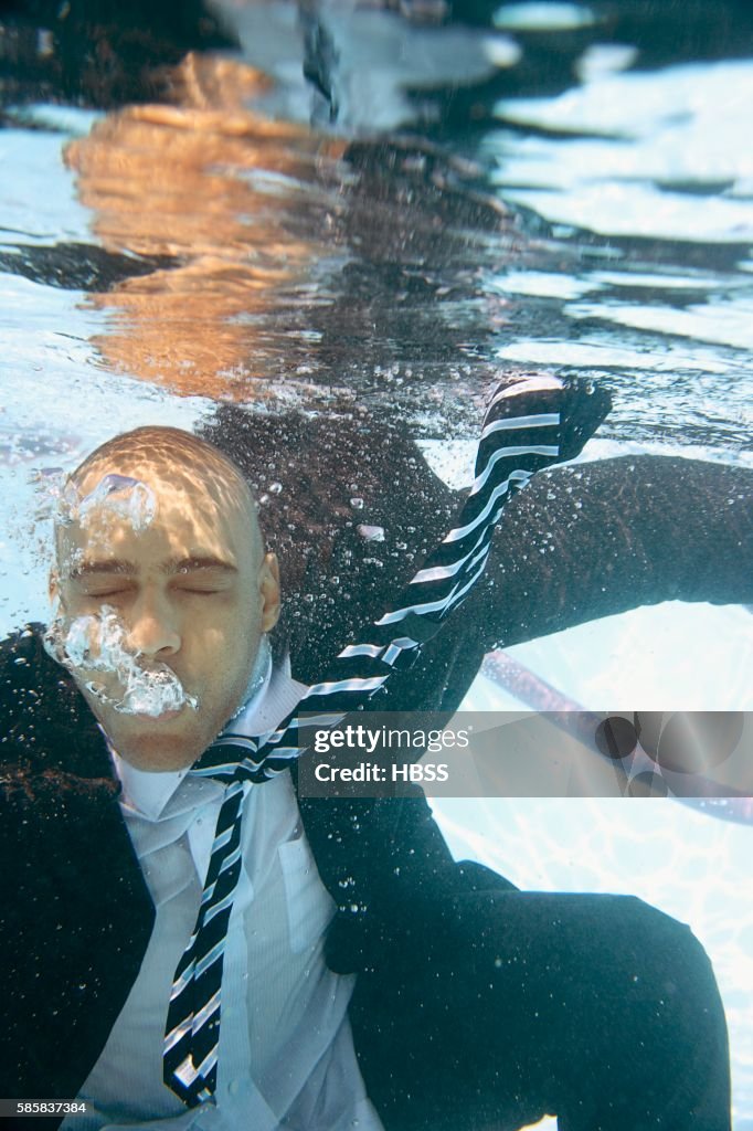Businessman In Swimming Pool High-Res Stock Photo - Getty Images