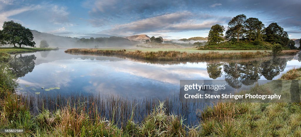 Early Morning River Reflections