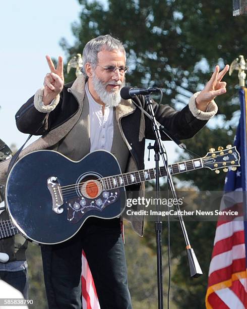 Yusuf Islam, the singer formally known as Cat Stevens, performs at The Rally to Restore Sanity on the Mall of the Nation's Capitol.