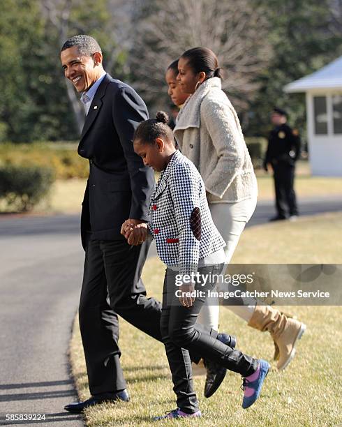 The First Family returns home to the White House following their Christmas vacation to Hawaii. Sasha, President Obama, The First Lady Michelle and...