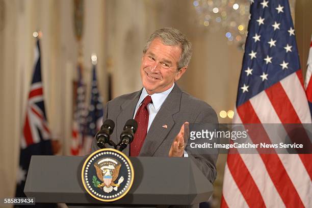 The White House- Washington DC President George W. Bush jokes with reporters during a joint press conference with Australian President Howard in the...