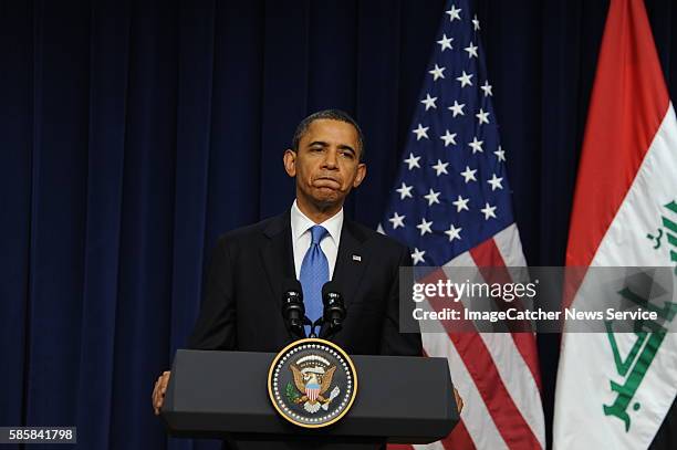 President Barack Obama and Prime Minister Nouri al-Maliki of Iraq at the White House hold a joint press conference to discuss the final troops being...